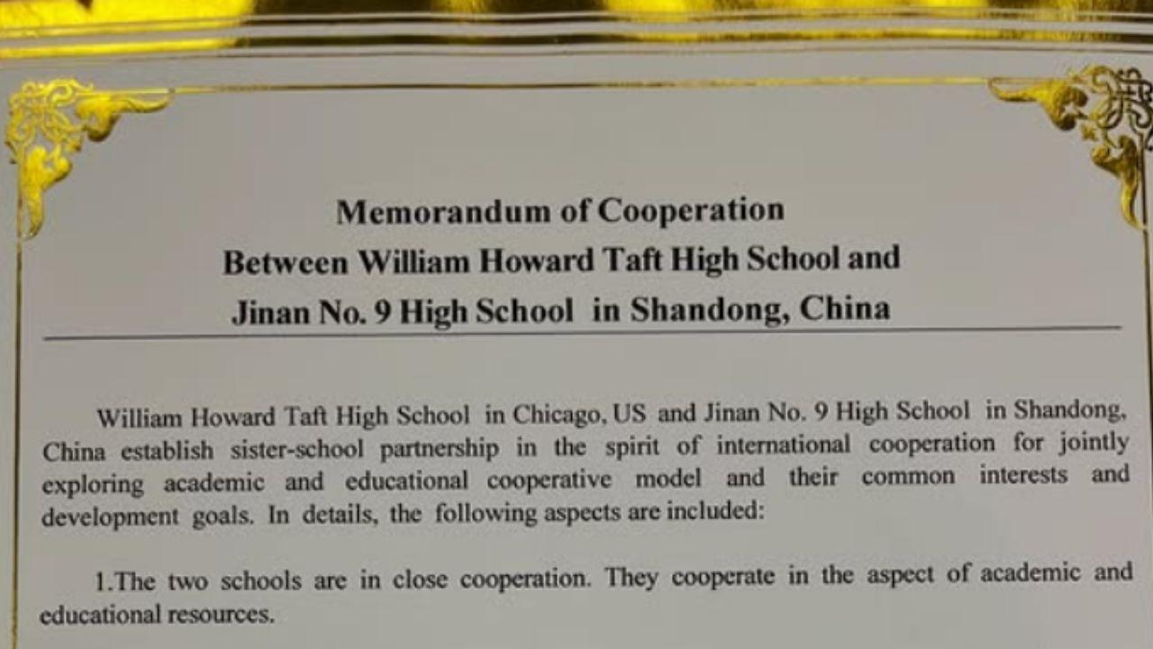 A photo of a 'School Cooperation Memorandum of Understanding'