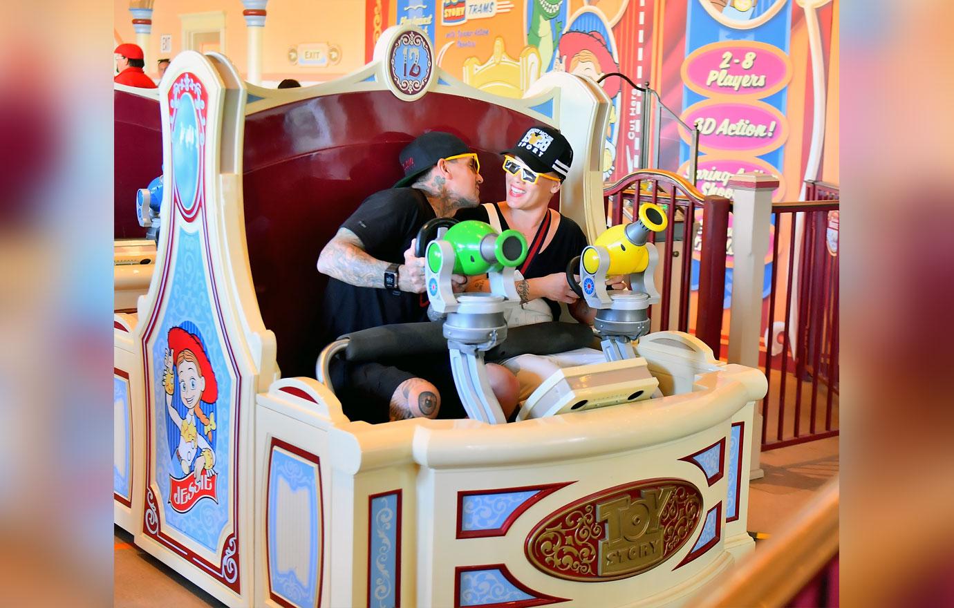 Pink And Carey Hart in Disneyland PDA