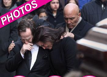 //madonna badger sobs funeral kids fire getty