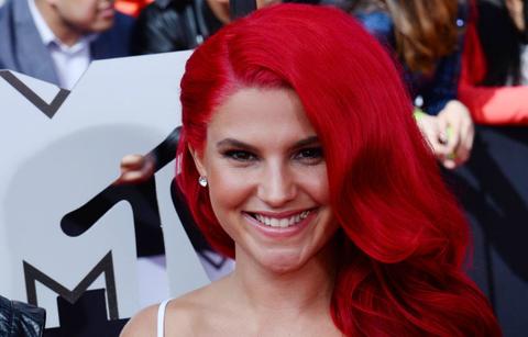 Carly Aquilino arrived at the MTV Movie Awards with a flaming red hairdo!