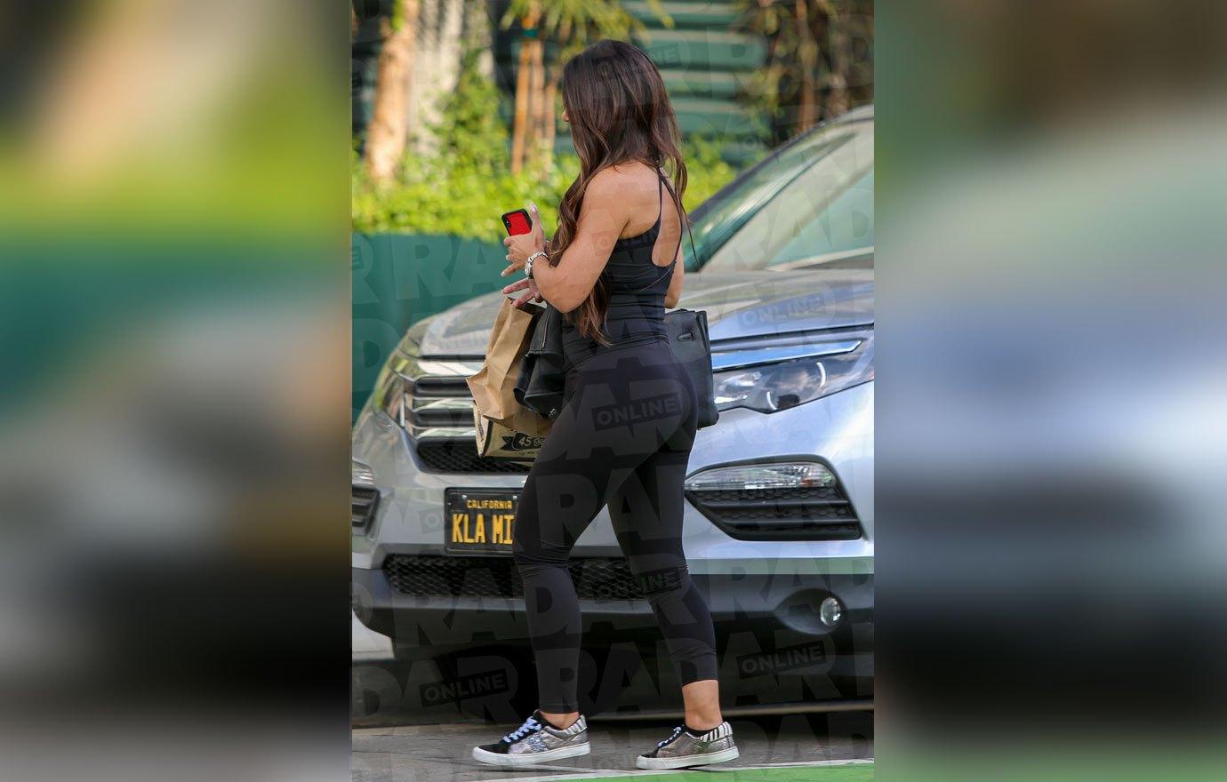 Teresa Giudice Wearing Black Top and Black Leggings Walking Around LA Without Her Wedding Ring