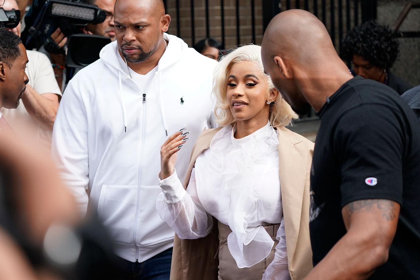 Cardi B Turns Herself In Photos