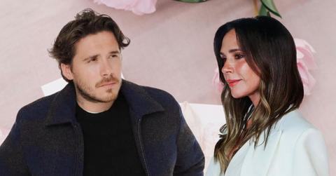 Photo of Brooklyn and Victoria Beckham