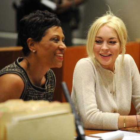 //lindsay lohan shawn holley square getty