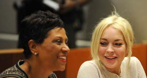 //lindsay lohan shawn holley square getty