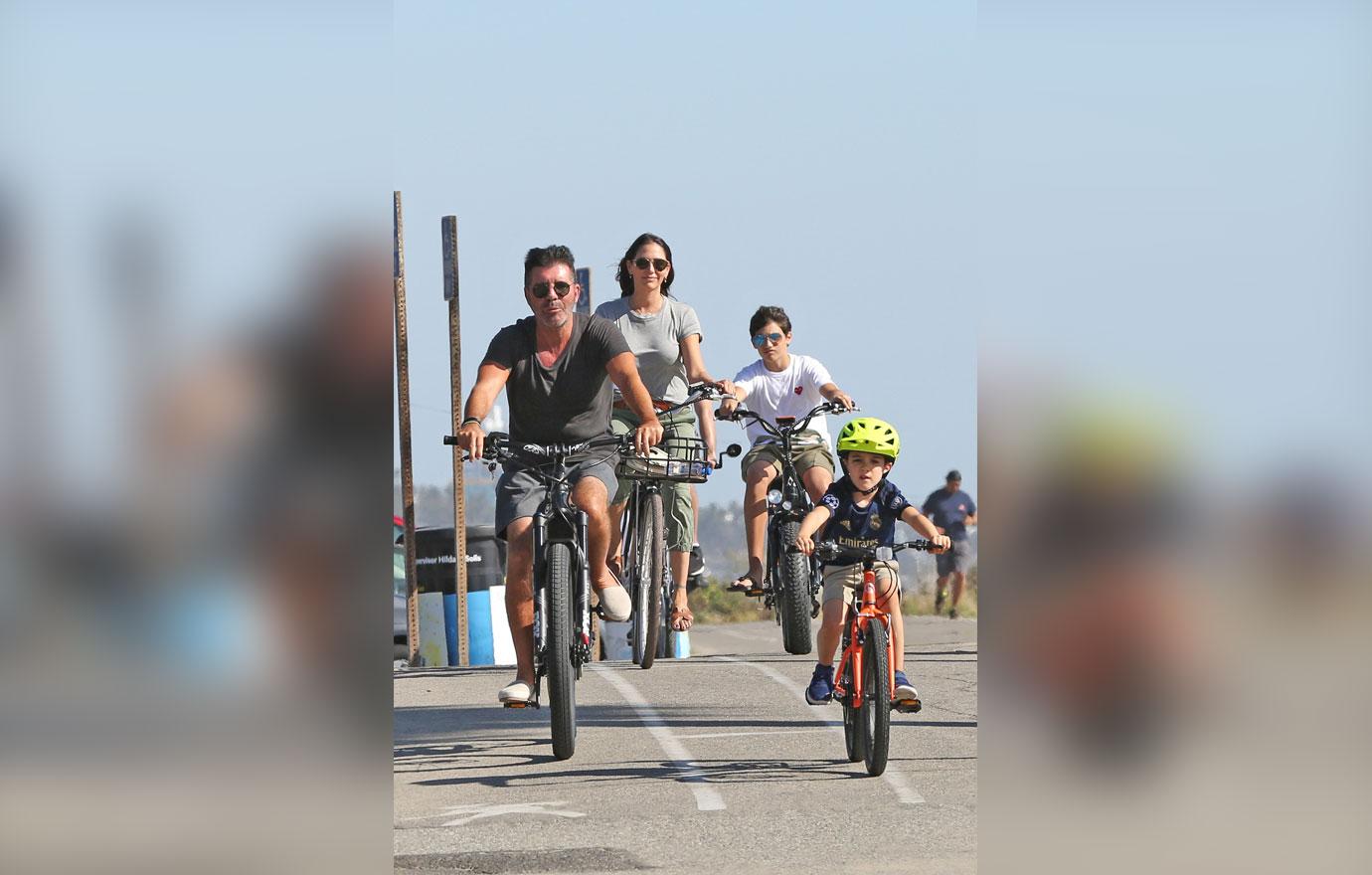 Simon Cowell Goes Bike Riding With His Family