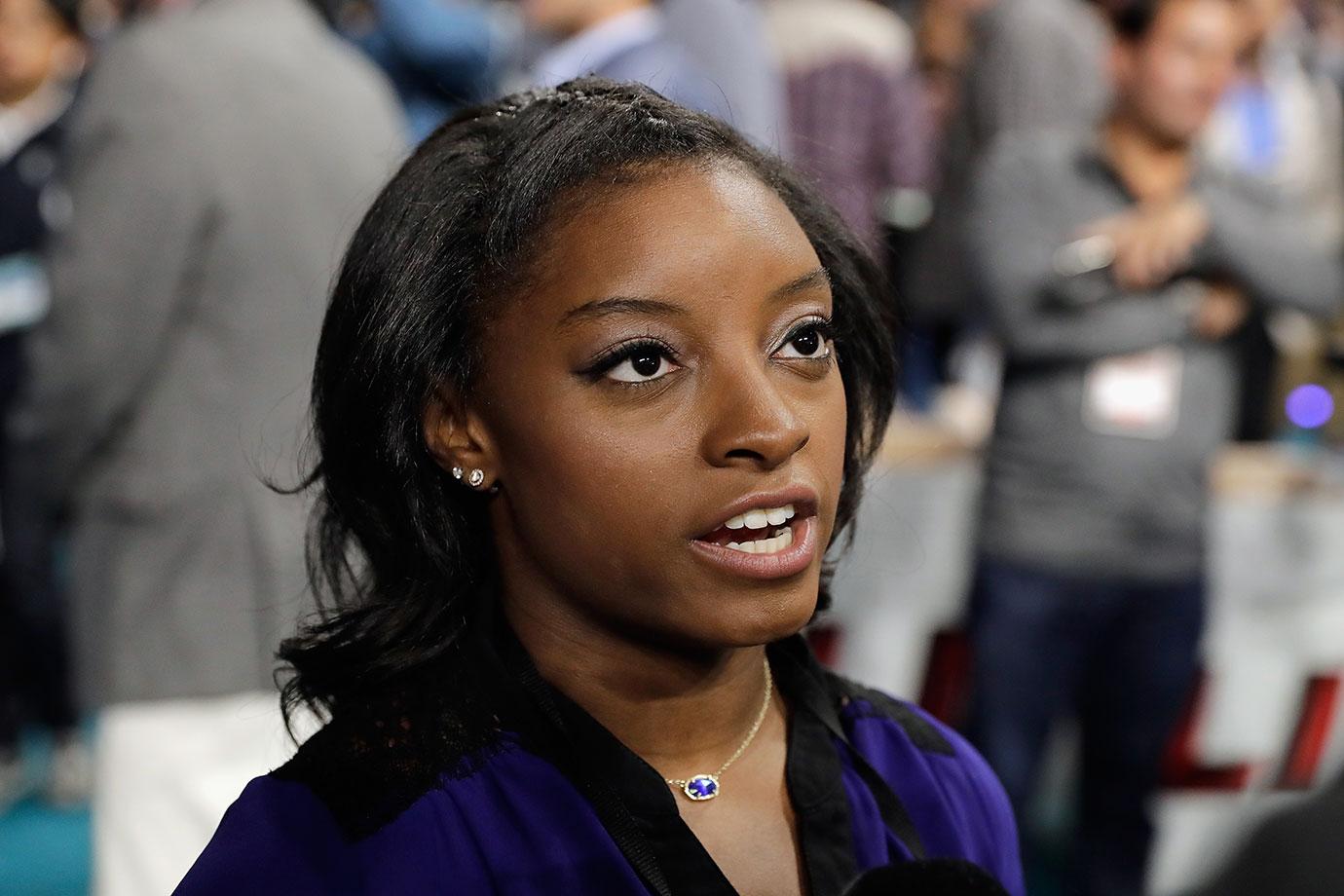 simone biles troubled childhood dad evicted sister car accident dwts