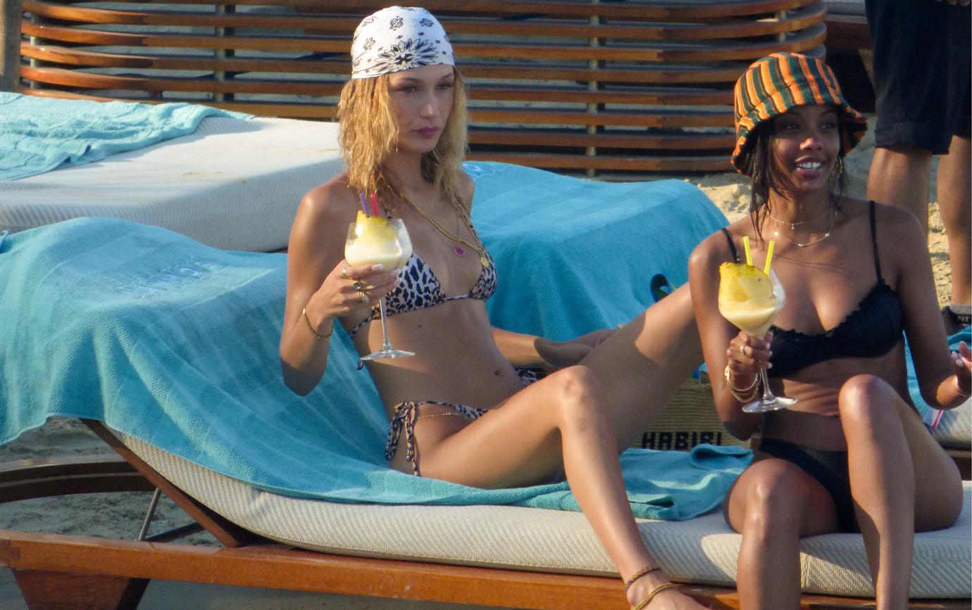 Bella Hadid and Friend Lounging in Bikinis and Drinking Cocktaills