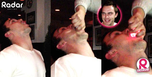 //nicholas hoult takes dangerous flaming shot wide