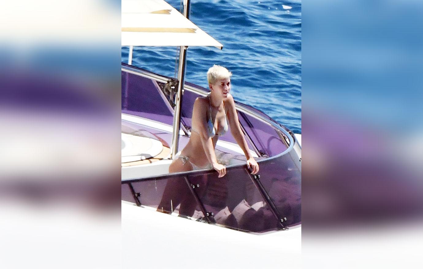 Katy perry shows off curves tiny bikini italy