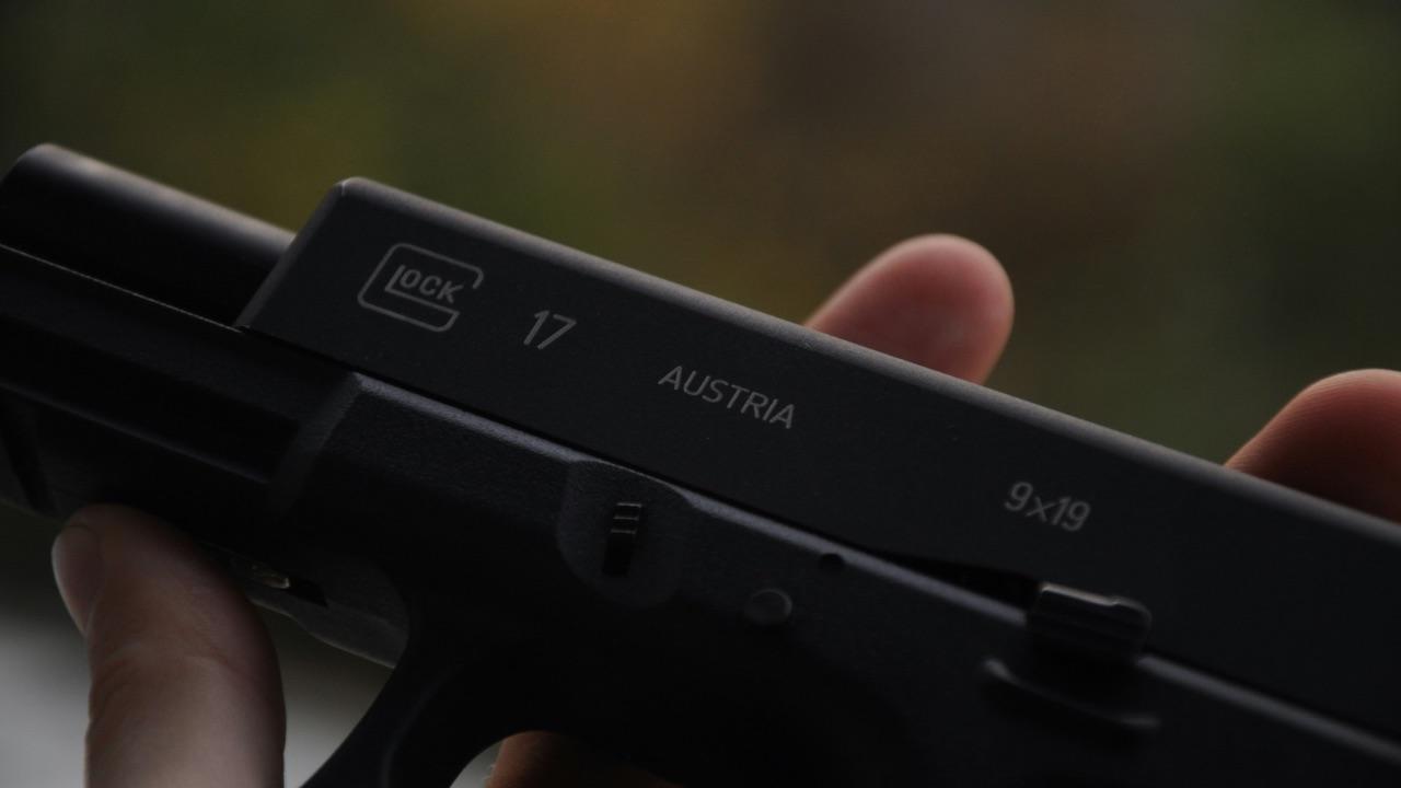A pink-and-black Glock was found at the scene, along with a shell casing.