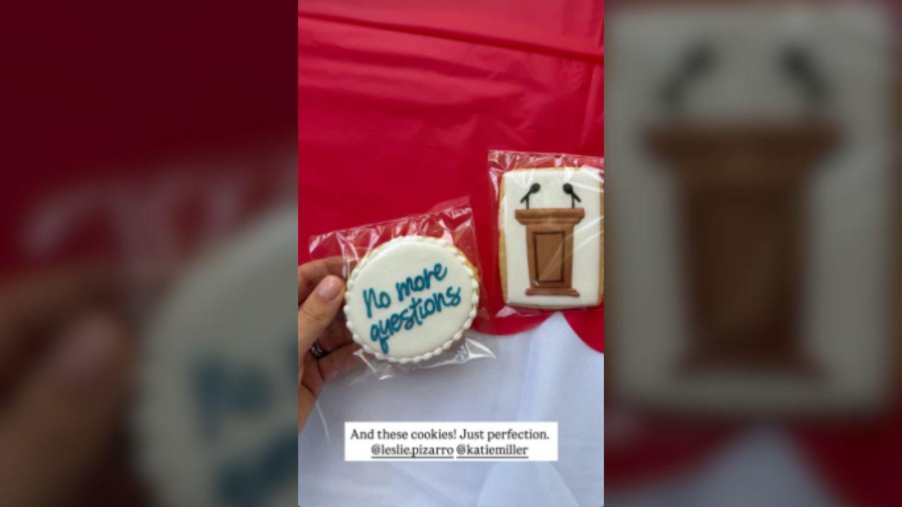image of One cookie featured the words 'no more questions' in blue icing.