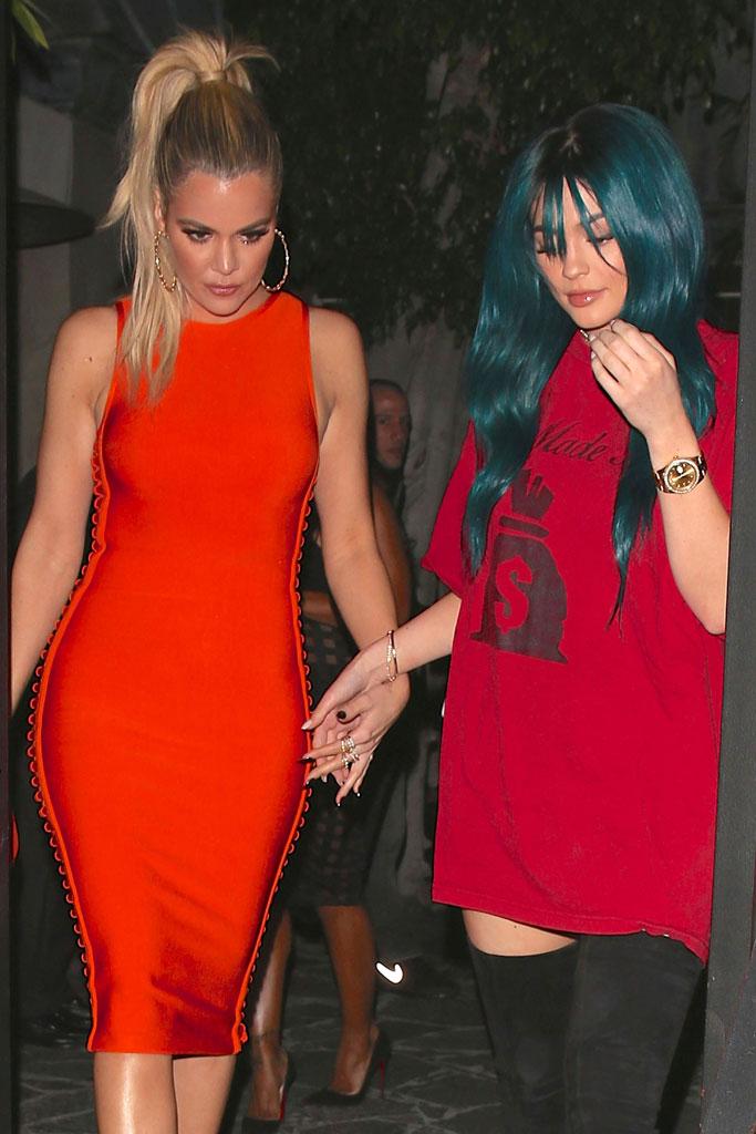 //khloe kardashian weight loss tight orange dress