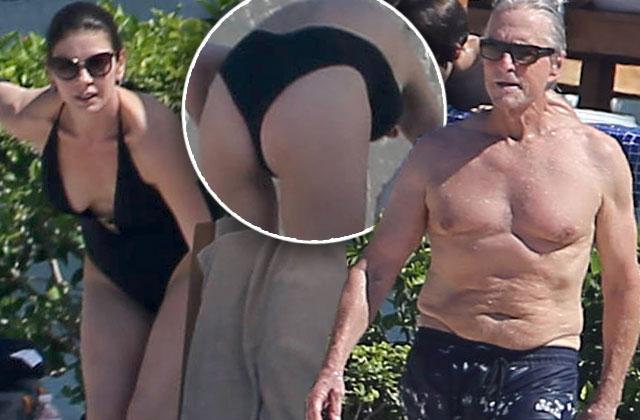 Catherine Zeta-Jones Bares Her Butt & Cleavage In A Plunging Bikini