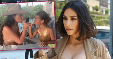Kim Kardashian Looking Shocked with Inset of Kim with Daughter North West Wearing Large Hoop Earrings