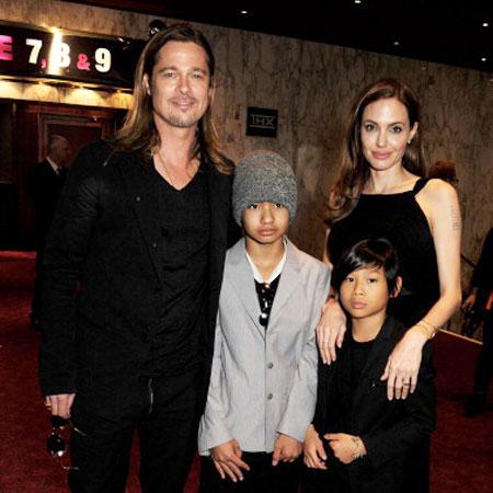 //brad pitt sons football pp