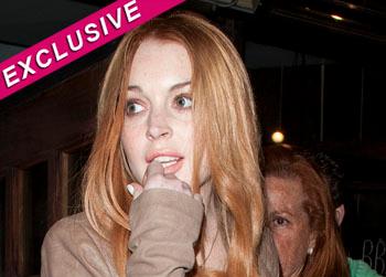 //lindsay lohan countersue hit run splash