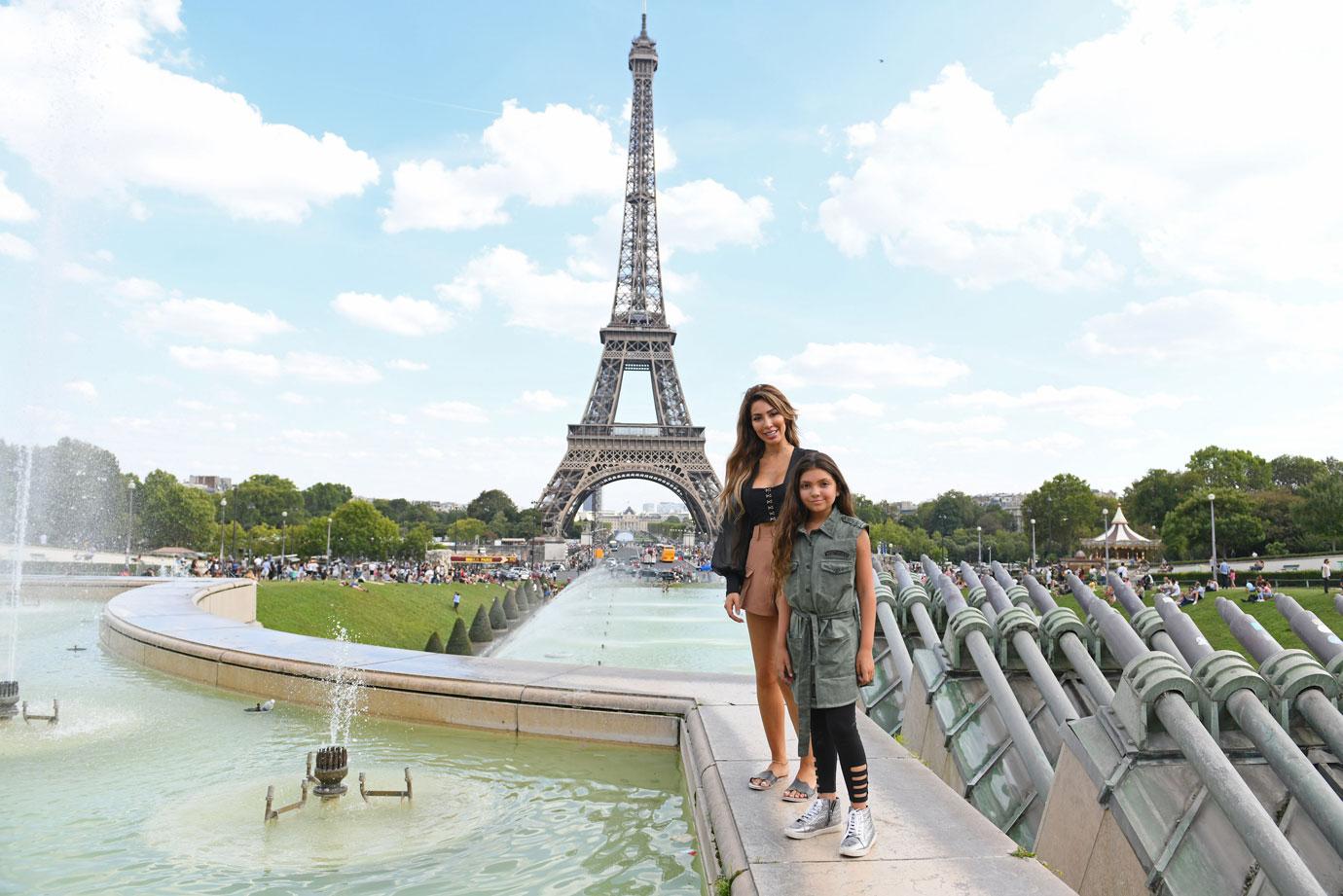 Farrah Abraham is seen with her daughter at the Eiffel Tower in Paris.