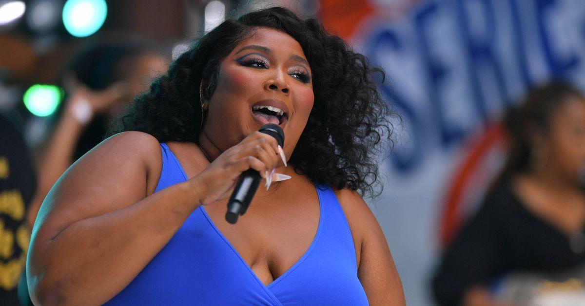 Lizzo's breast spill out as she flaunts her body in fur bikini (photos)