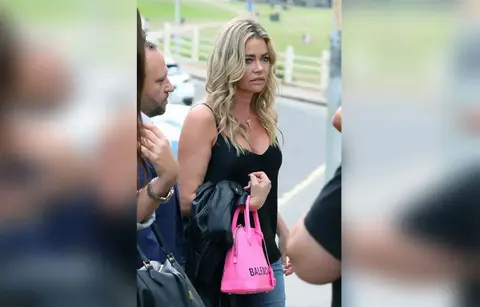 denise richards husband aaron lawsuit dismissed settlement avoids trial rhobh real housewives beverly hills