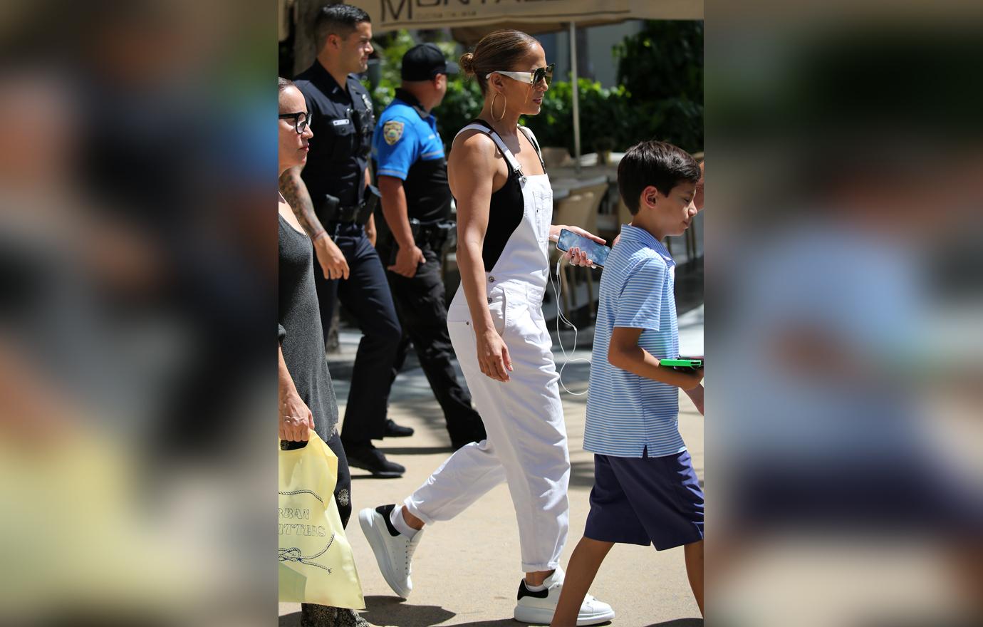 Jennifer Lopez takes her twins Max and Emme shopping at the Lincoln Road Mall in Miami. The group stopped by an Urban Outfitters store to peruse the selection.