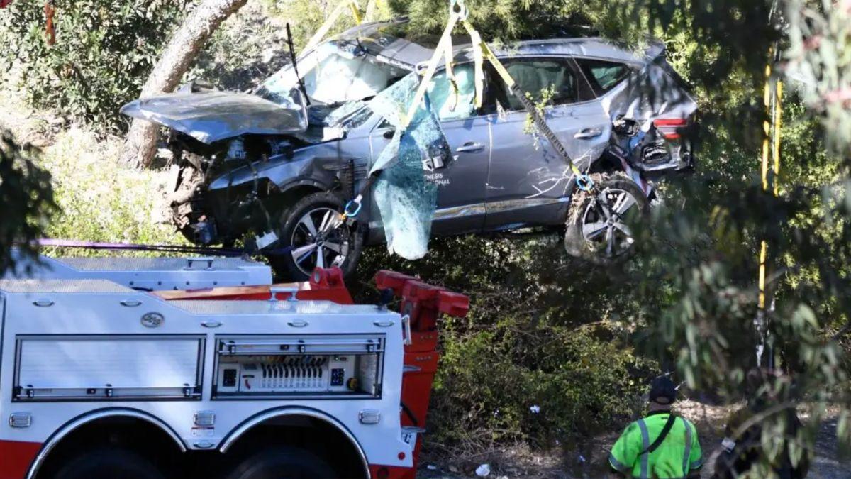 Firefighters had to cut a trapped Woods from his mangled SUV following his 2021 solo rollover.