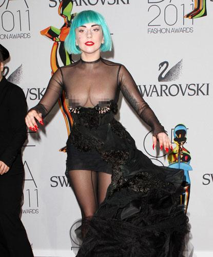 Us Weekly on X: Oops! Lady Gaga had a nip slip on the #GRAMMYs