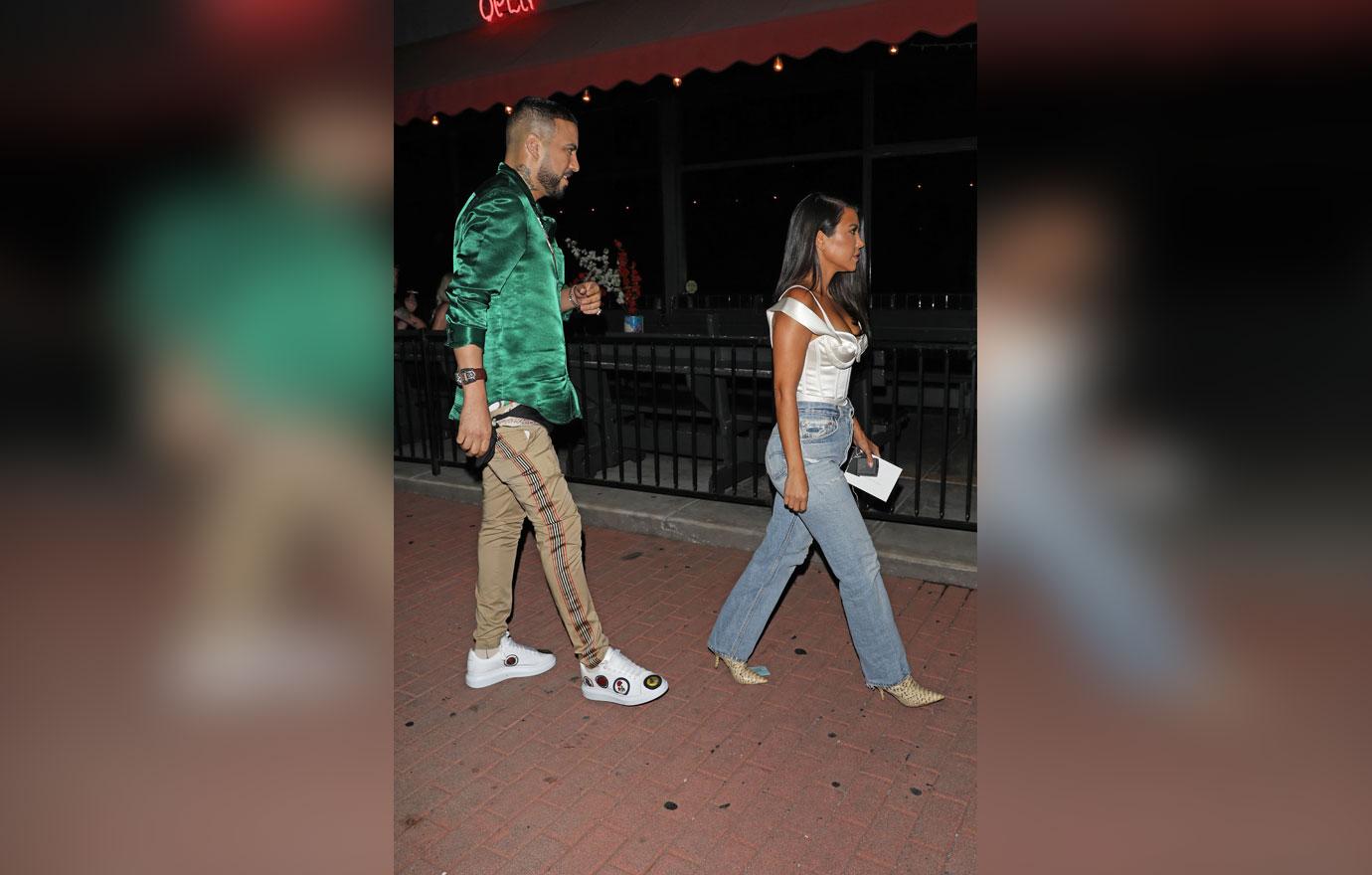 Kourtney Kardashian and French Montana arrive together to Genghis Cohen to celebrate Steph Steph's birthday party in Los Angeles.