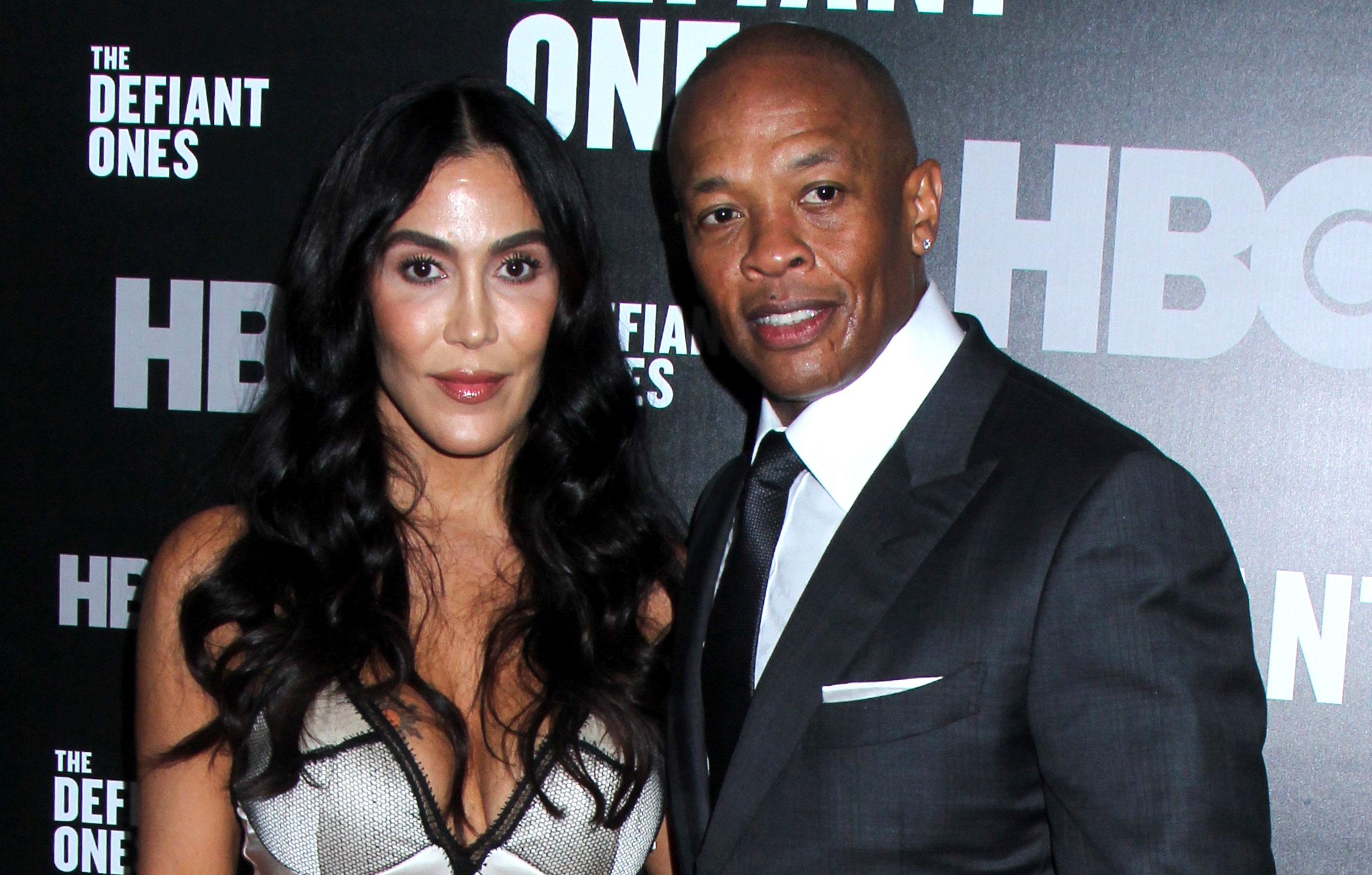 dr dre ex wife nicole young scores rolls royce cadillac escalada limo  million divorce deal