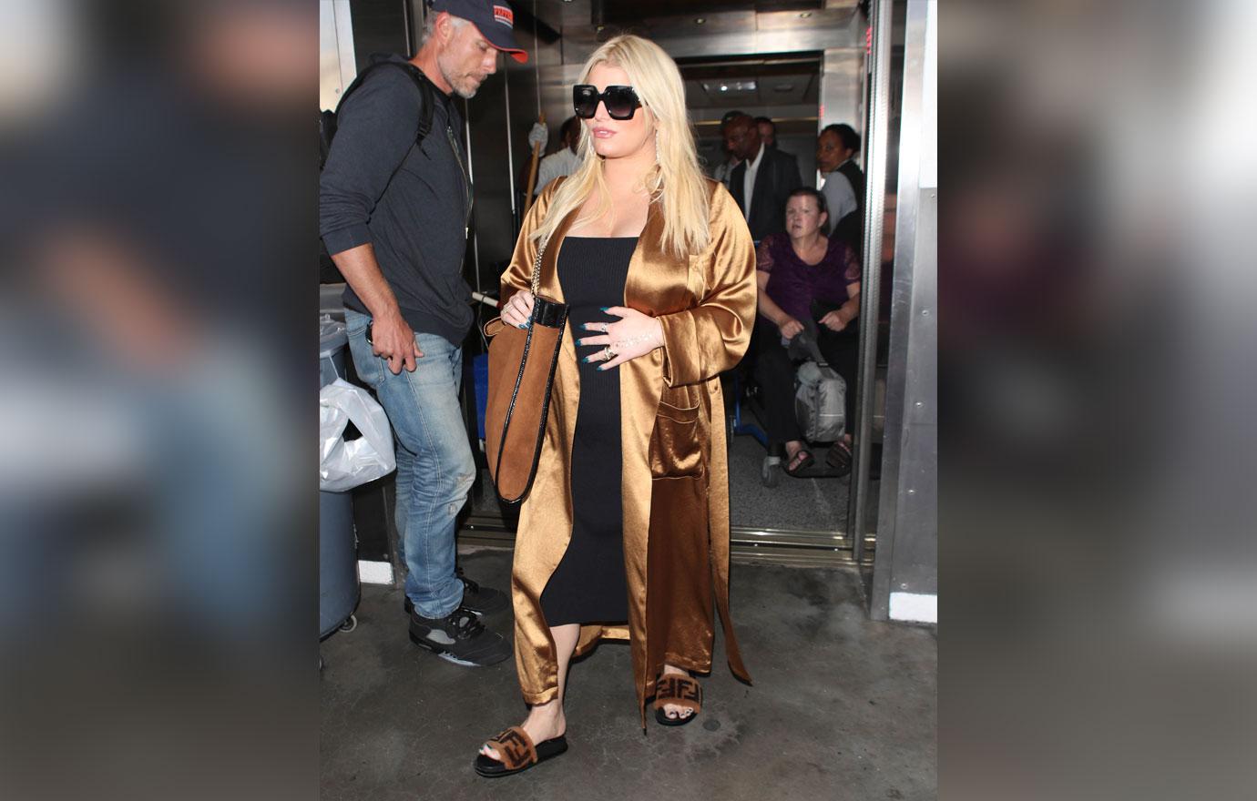 Pregnant Jessica Simpson And Husband Seen At Airport