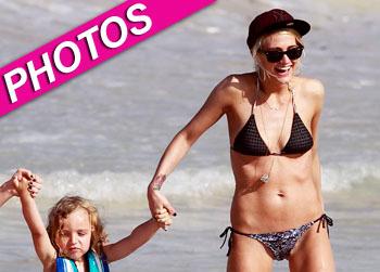 //ashlee simpson bronx beach bikini hawaii post