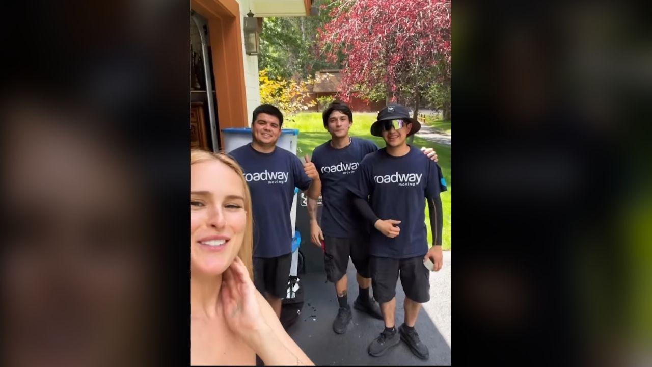 Photo of Rumer Willis with moving crew
