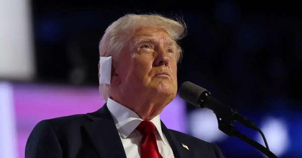 Donald Trump pictured with a ear bandage