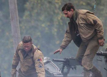 Shia LaBeouf and Brad Pitt are seen on set of the World War II film 'Fury'