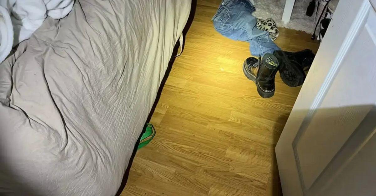 Police photographed a bedroom floor at 1122 King Road.