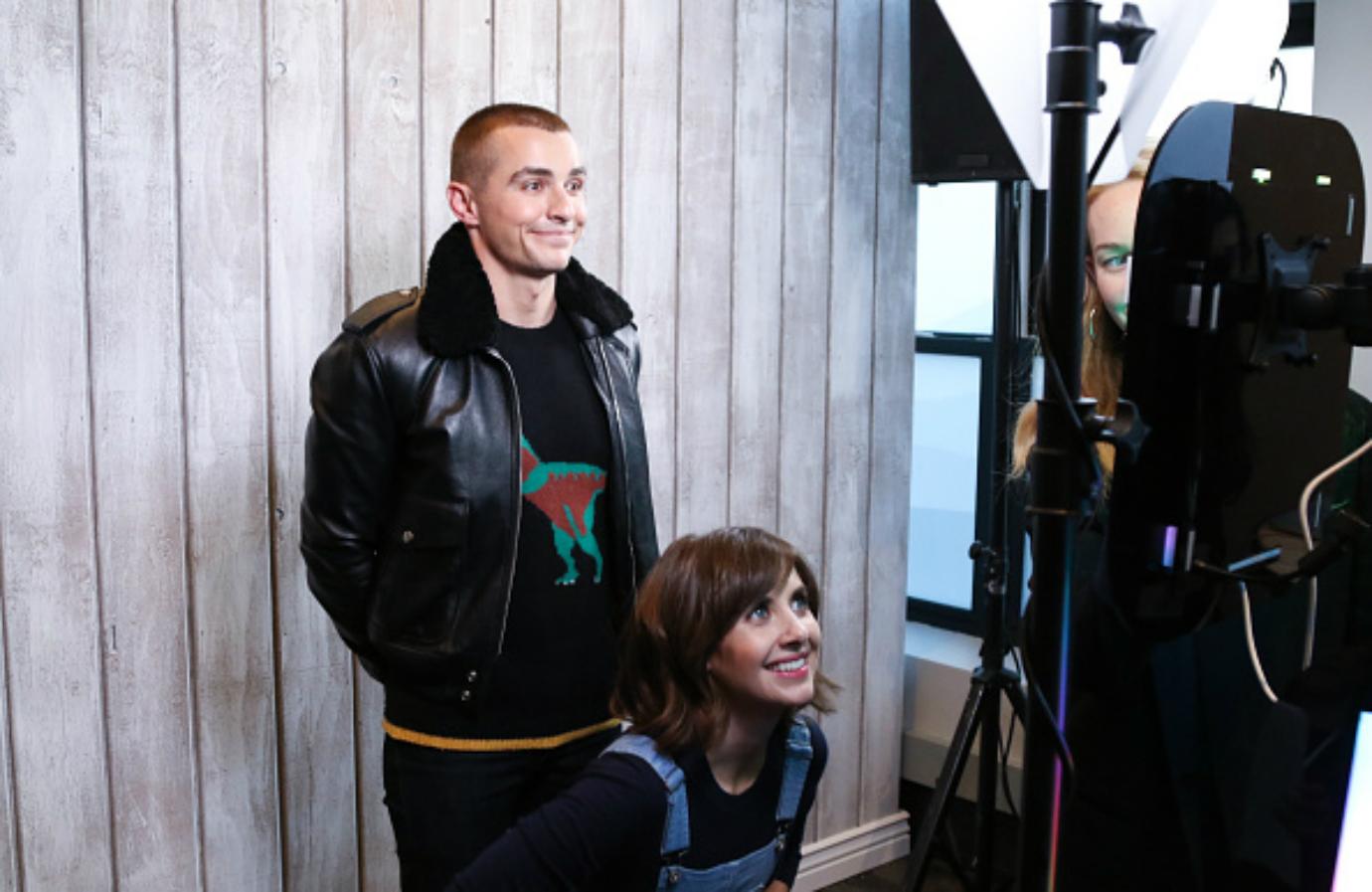 Alison Brie and Dave Franco appear in front of the camera together.