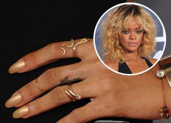 //rihanna gold nail polish getty wenn