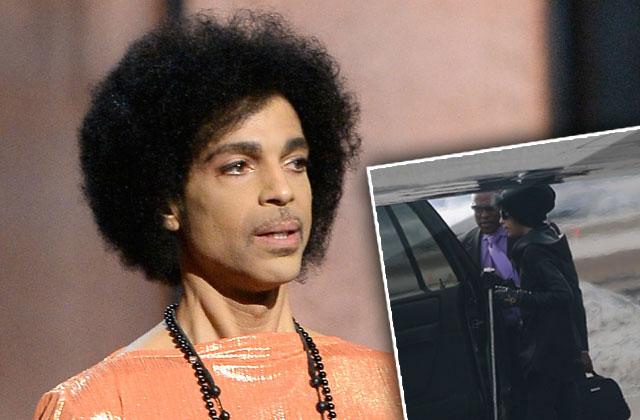 Prince and his bedazzled cane steal the show at NBA game