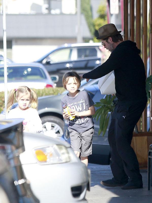 Brad Pitt Photos -- Actor Sports Black Eye Taking Out Twins Vivienne and Knox