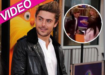 //zac efron condom red carpet