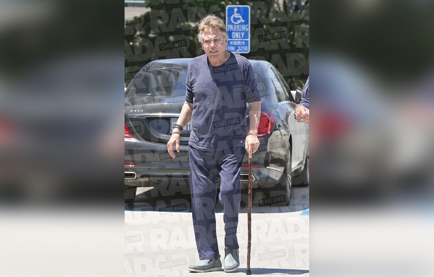 ryan oneal confronted son redmond stabbing victim hospital photos