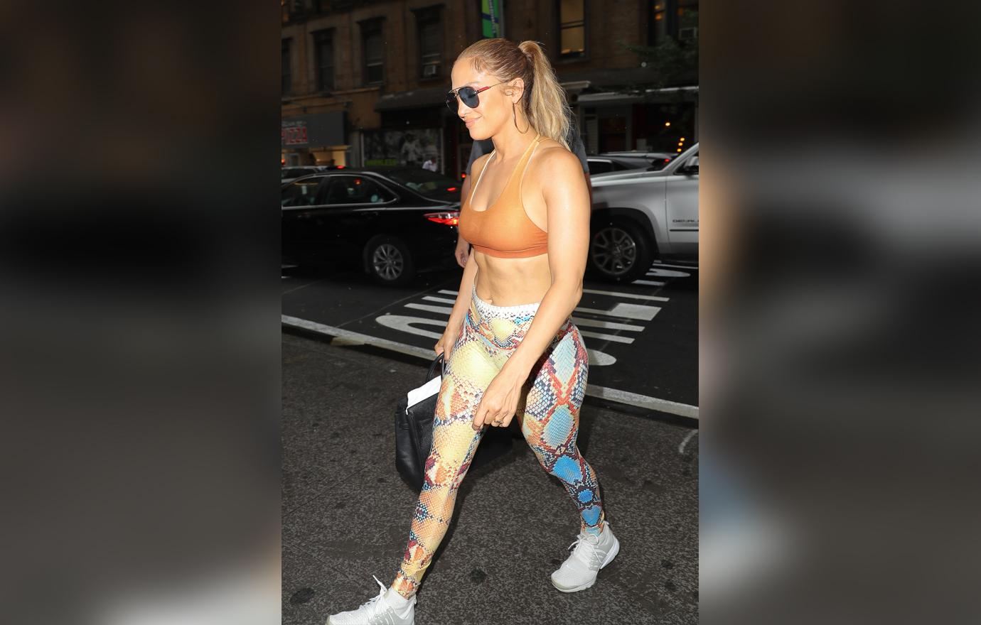 Jennifer Lopez Shows Off Abs To Distract From A Rod Engagement Rumors.