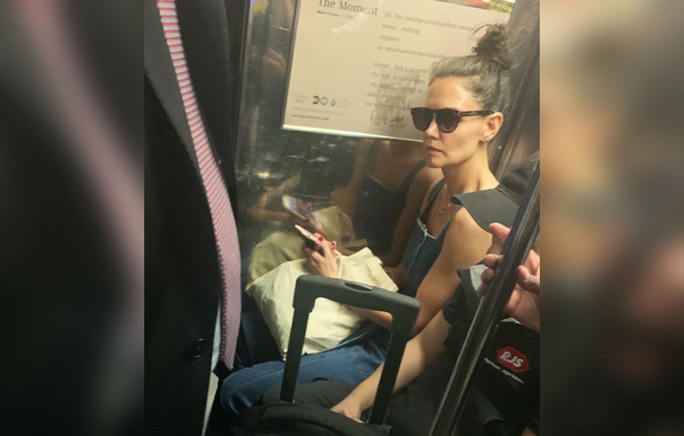 Katie Holmes Rides NYC Subway in Overalls and Sunglasses