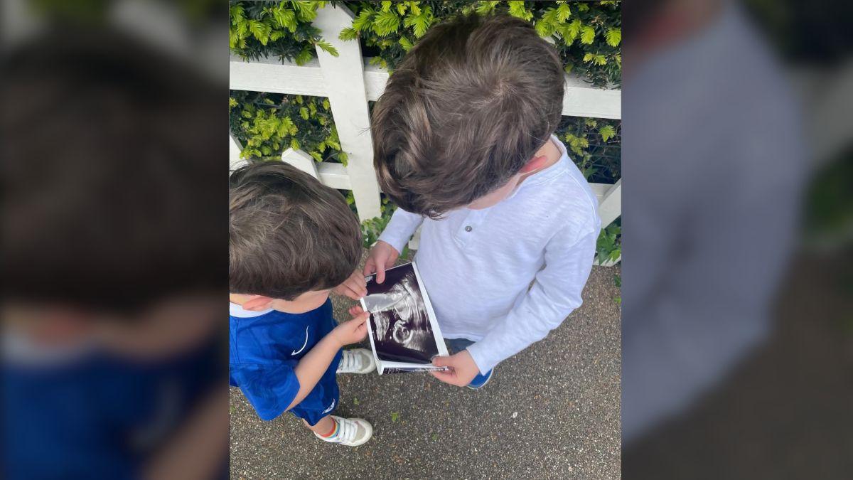 Photo of August and Ernest Brooksbank with sonogram
