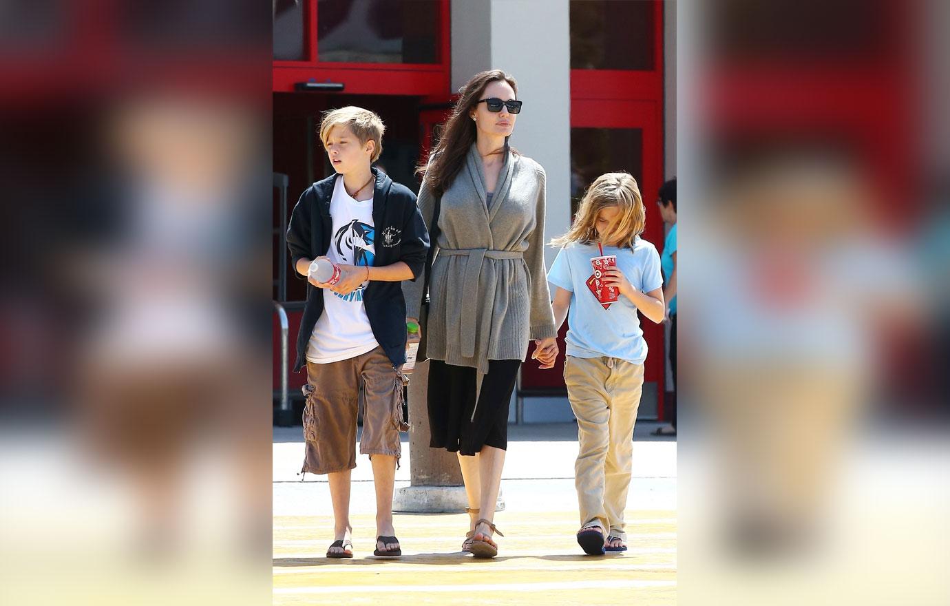 Angelina Jolie Takes Daughters Shiloh and Vivienne Shopping At Target