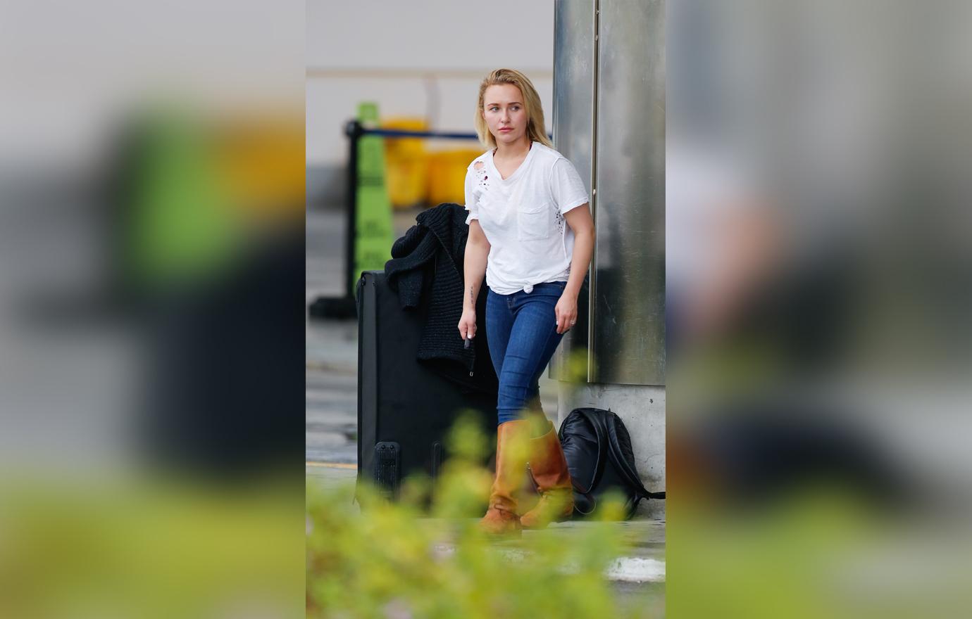 Hayden Panettiere Looks Serious Outside An Airport With Her Luggage