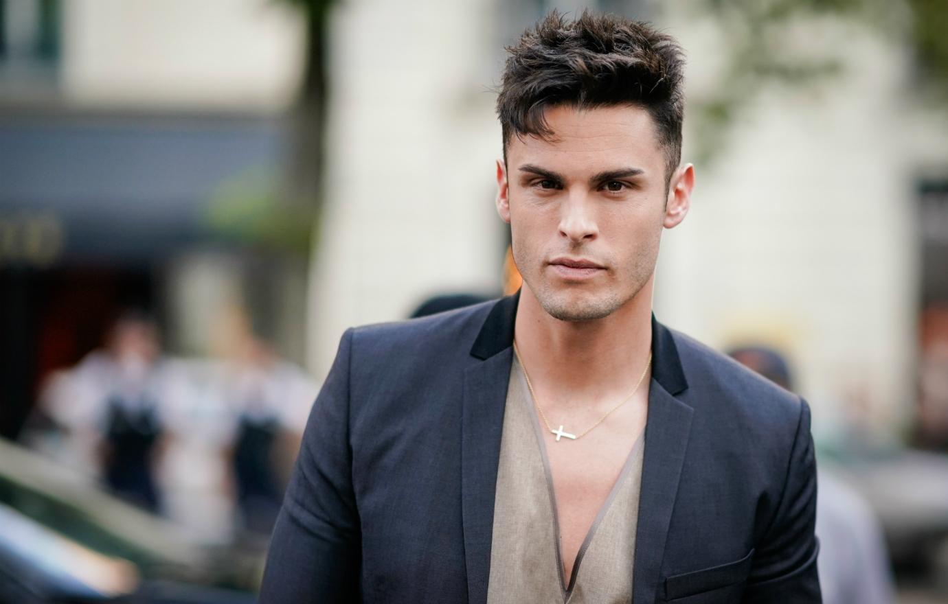 Baptiste Giabiconi is seen, outside the Fendi show, during Paris Fashion Week - Haute Couture Fall/Winter 2017-2018, on July 5, 2017 in Paris, France.