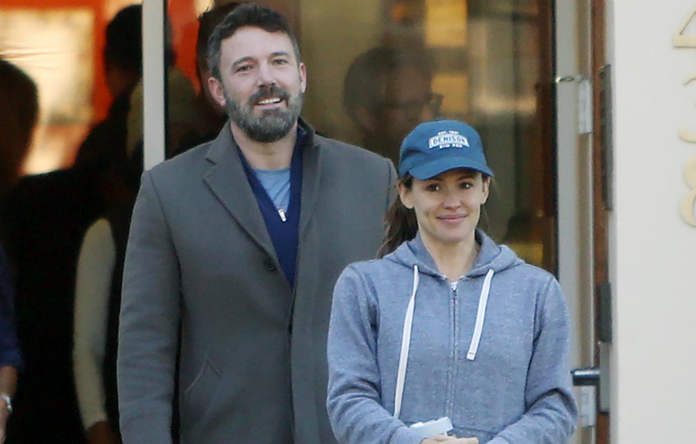 Jennifer Garner, who wore black yoga pants, a grey hoodie and a blue baseball hat, was seen with Ben Affleck, who sported a grey overcoat over a blue sweatshirt.