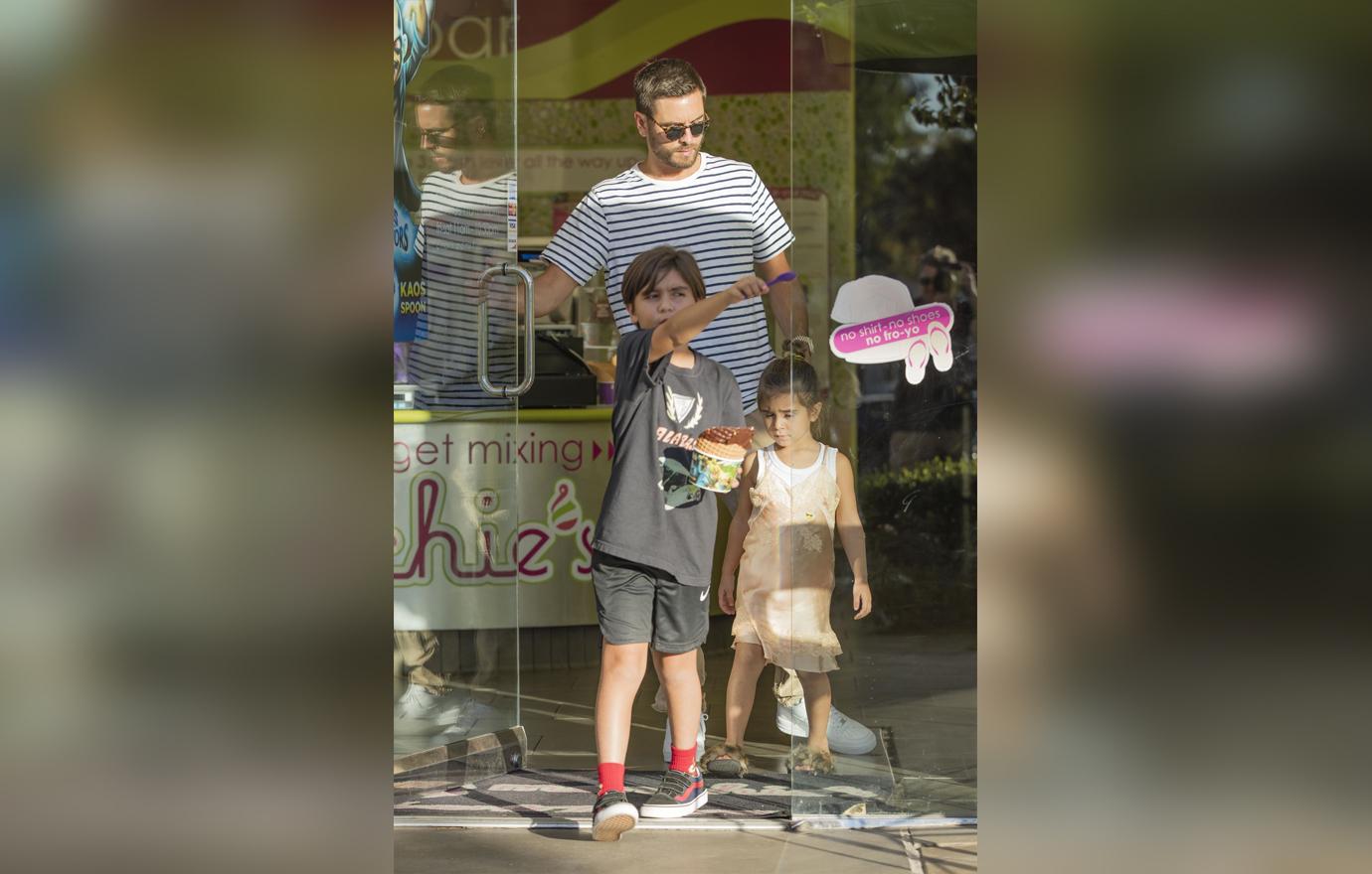 Scott Disick Watches Kids While Kourtney Kardashian Is In Paris