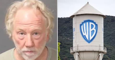 A photo of Timothy Busfield alongside the Warner Bros. logo on a water tower